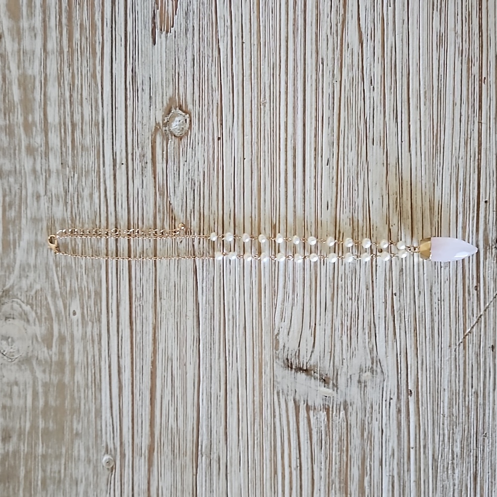 Gold necklace with pearls and stone, $5